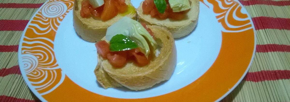 Bruschetta con pomodori e carciofini