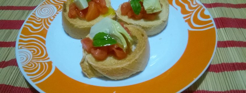 Bruschetta con pomodori e carciofini