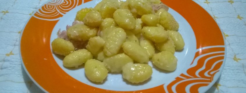Gnocchi gratinati ai formaggi e prosciutto cotto