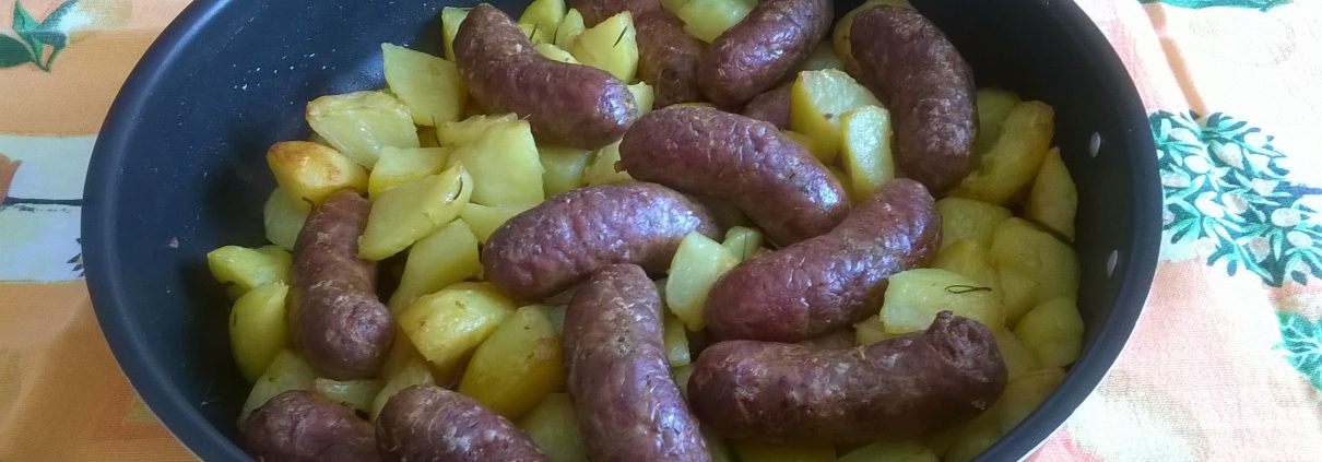 Salsicce e patate al forno