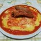 Polenta con salsicce e spuntature