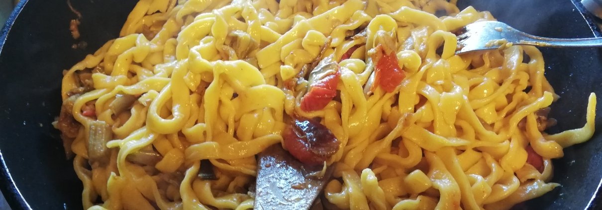 Fettuccine con carciofi e pomodorini