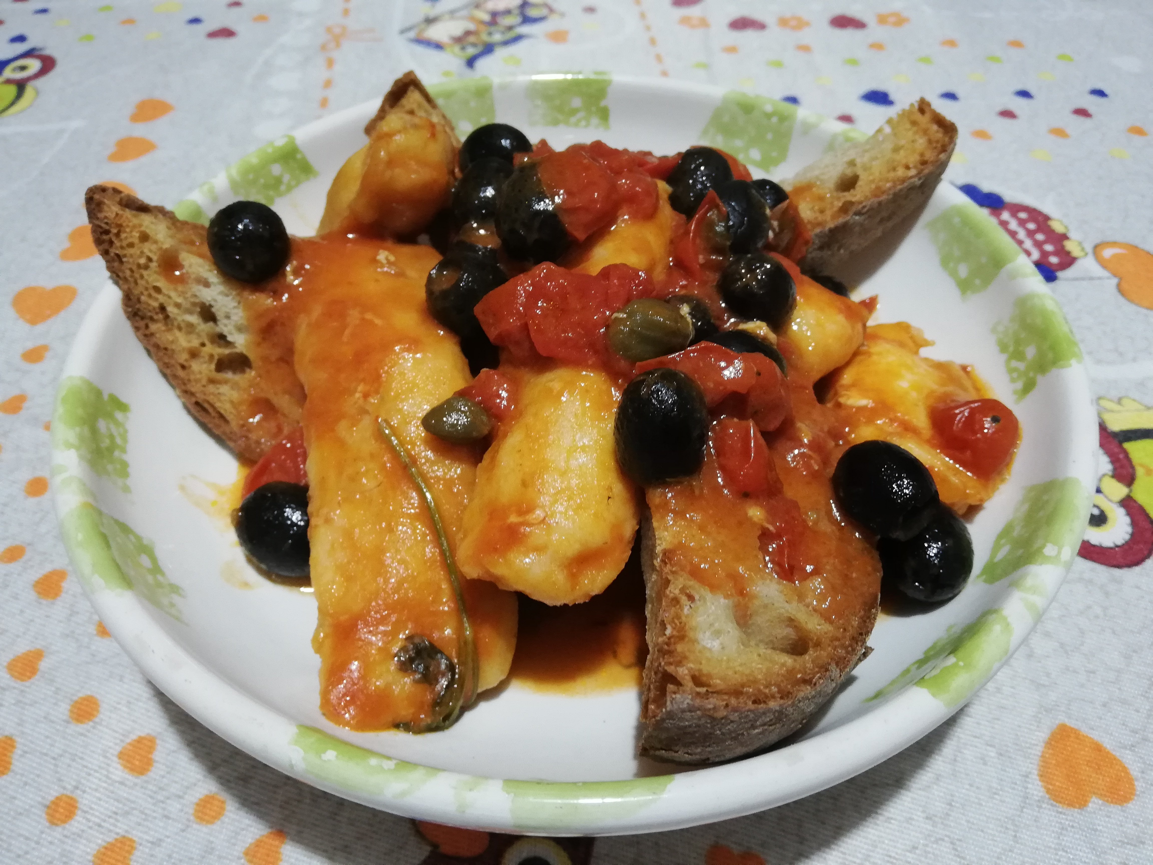 Filetti di merluzzo con olive e capperi