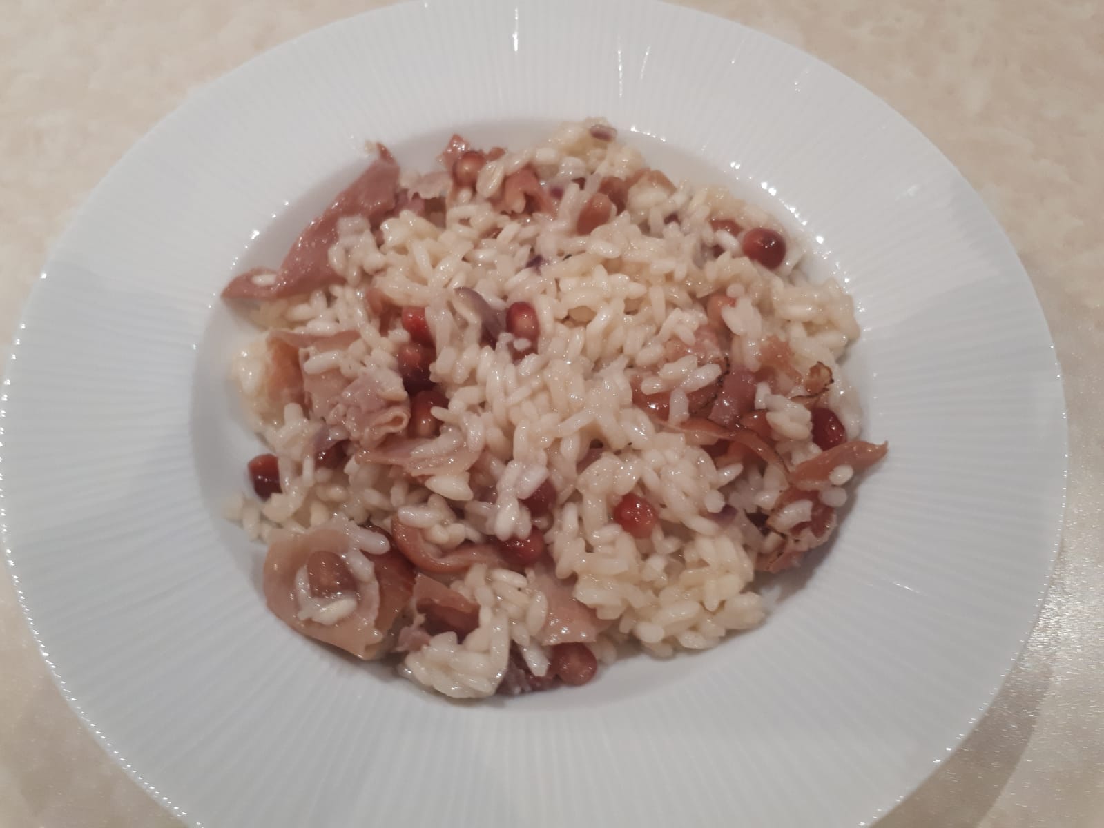 Risotto speck e melograno
