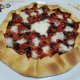Torta rustica con pomodorini, alici e mozzarella