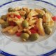 Straccetti di pollo al curry, pomodorini e olive