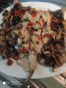 Merluzzo al forno con funghi champignon