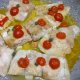 filetti di pesce persico con pomodorini e capperi