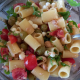 Pasta fredda con perline di mozzarella rughetta e pomodorini