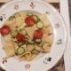 Calamarata con trota affumicata zucchine e pomodorini