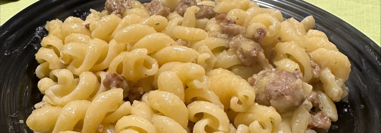 Pasta con salsiccia e crema di patate
