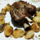 Stinco di maiale al forno con patate